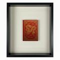 Red book cover in blue frame